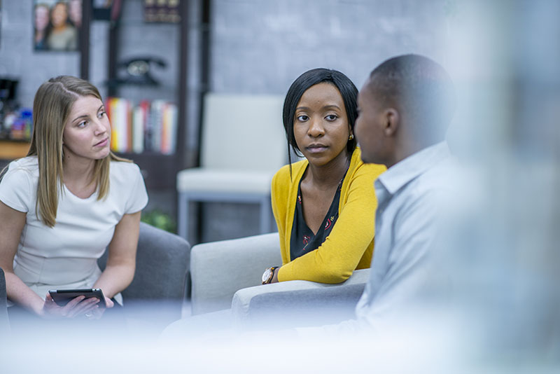 Young people listen to each other in a support group